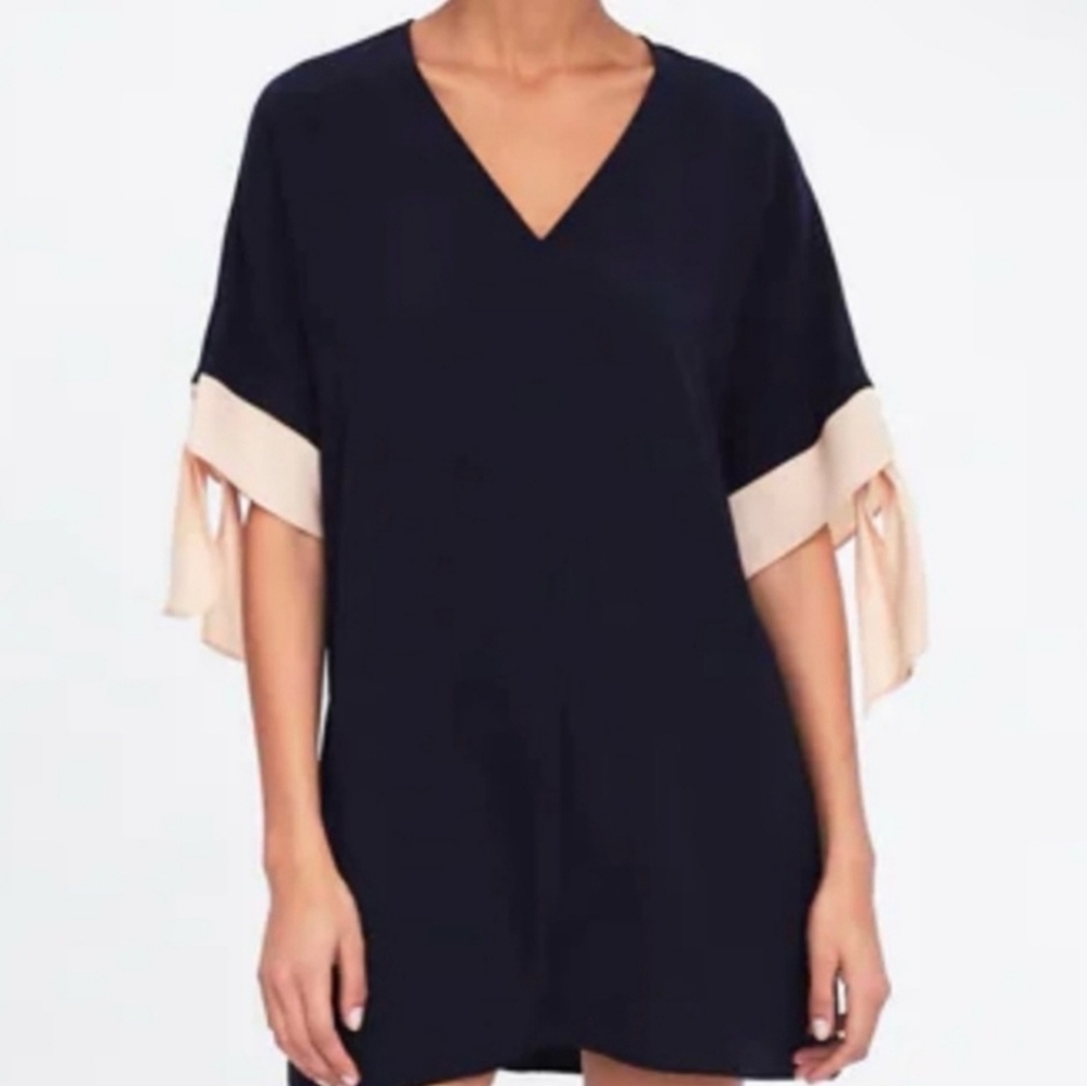 Zara blue and peachy pink bow sleeve front pockets fits small medium dress
